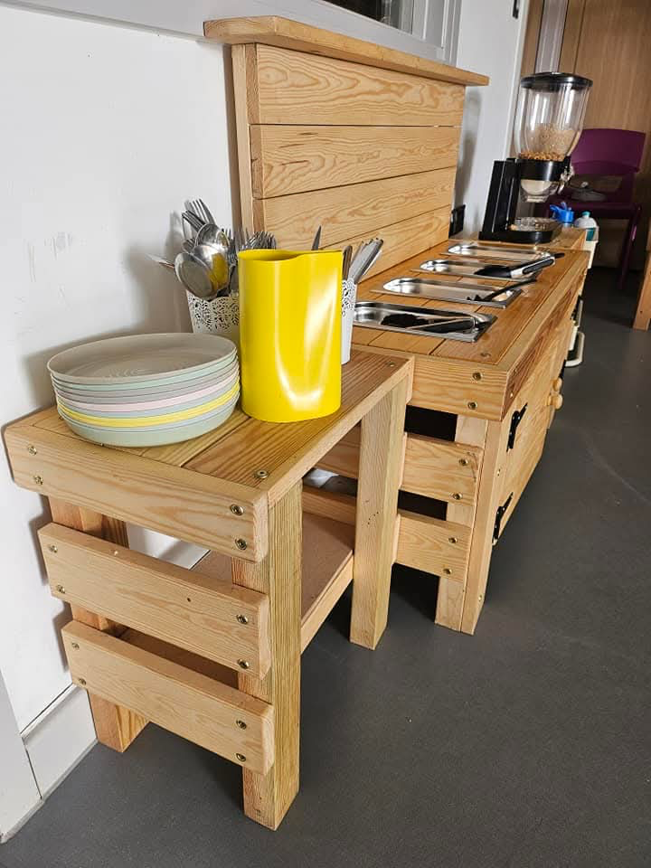 Children enjoying structured play in the Tan Y Lan nursery environment